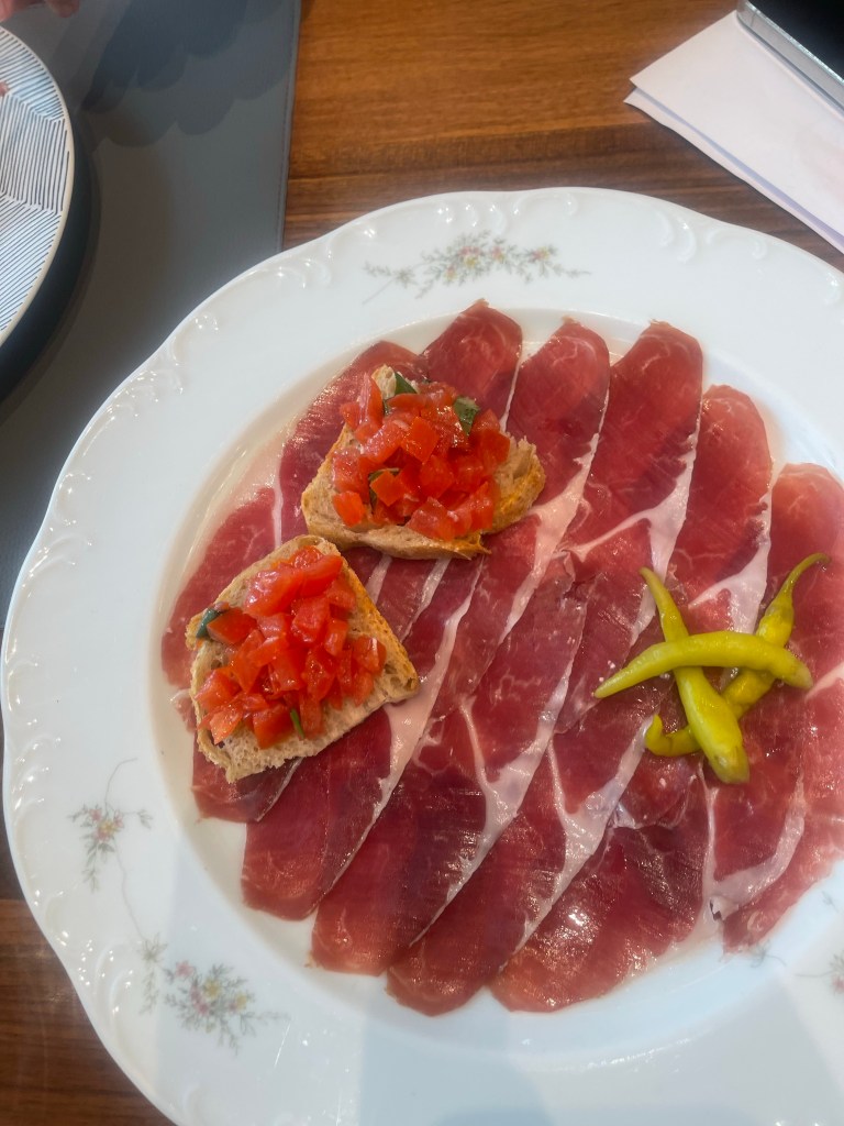 Beef carpaccio with appetizers 
