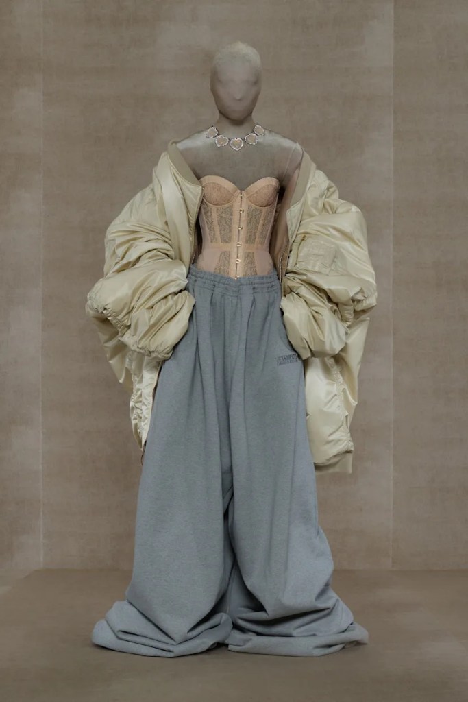 Mannequin dressed in pink corset top with sweatpants