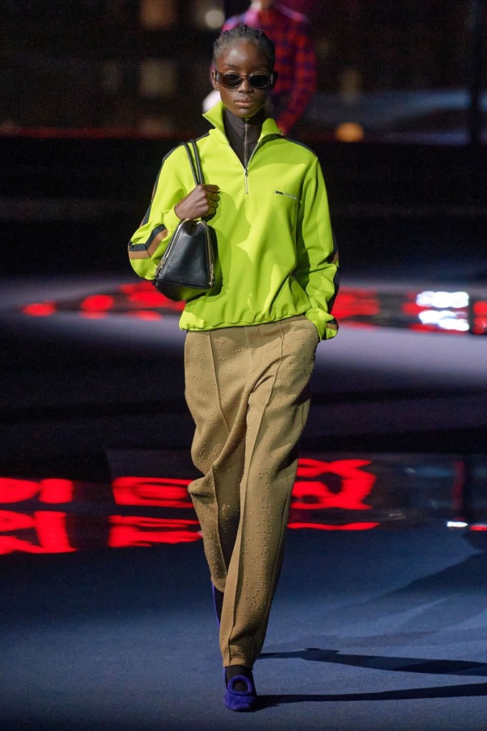 Model wearing neon green top