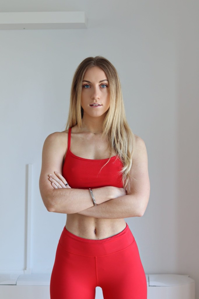 YouTuber Holly Dolke in red outfit 
